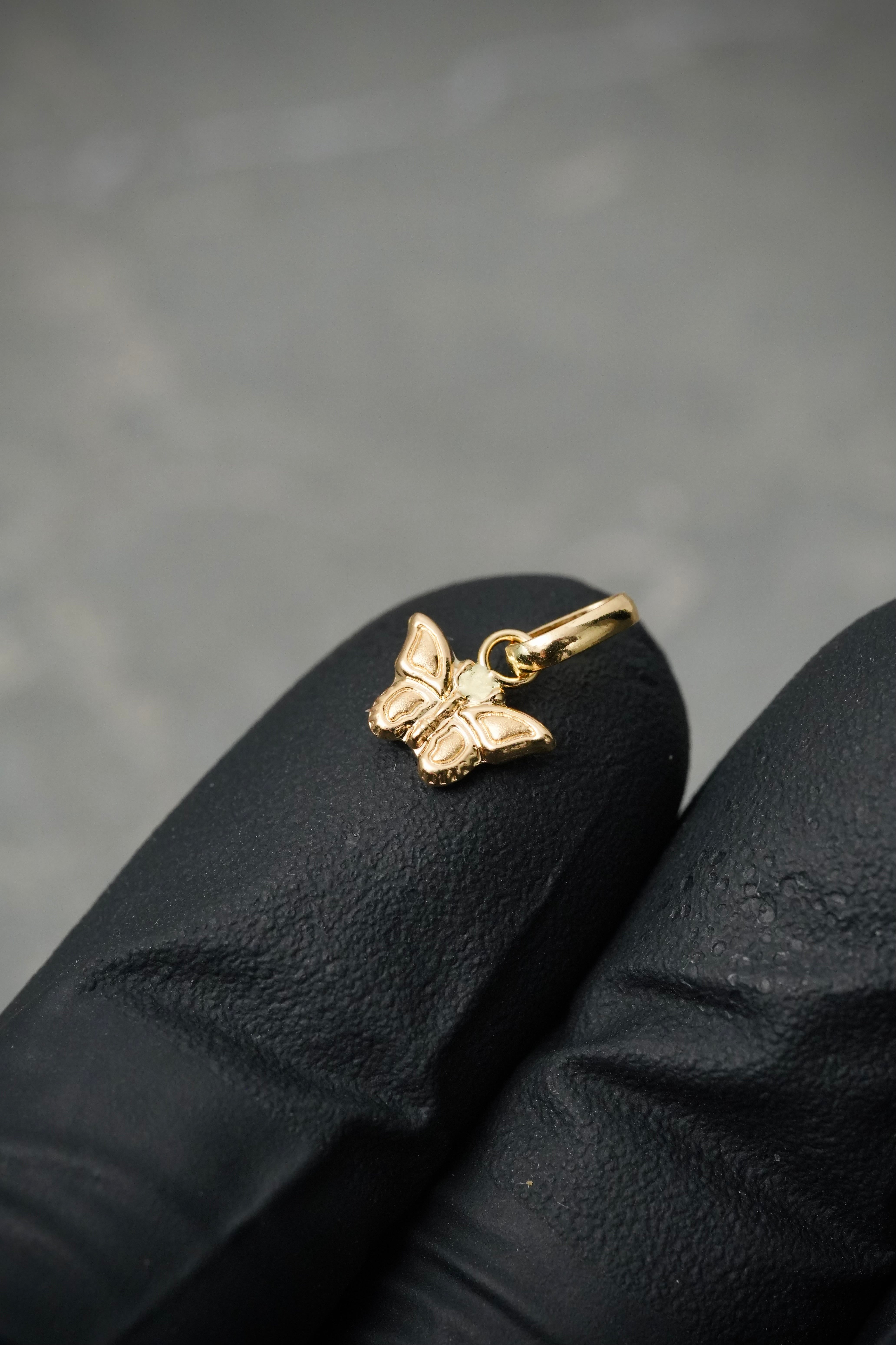 Dije mariposa 0.25gr / Largo 1.3cm — Oro Amarillo