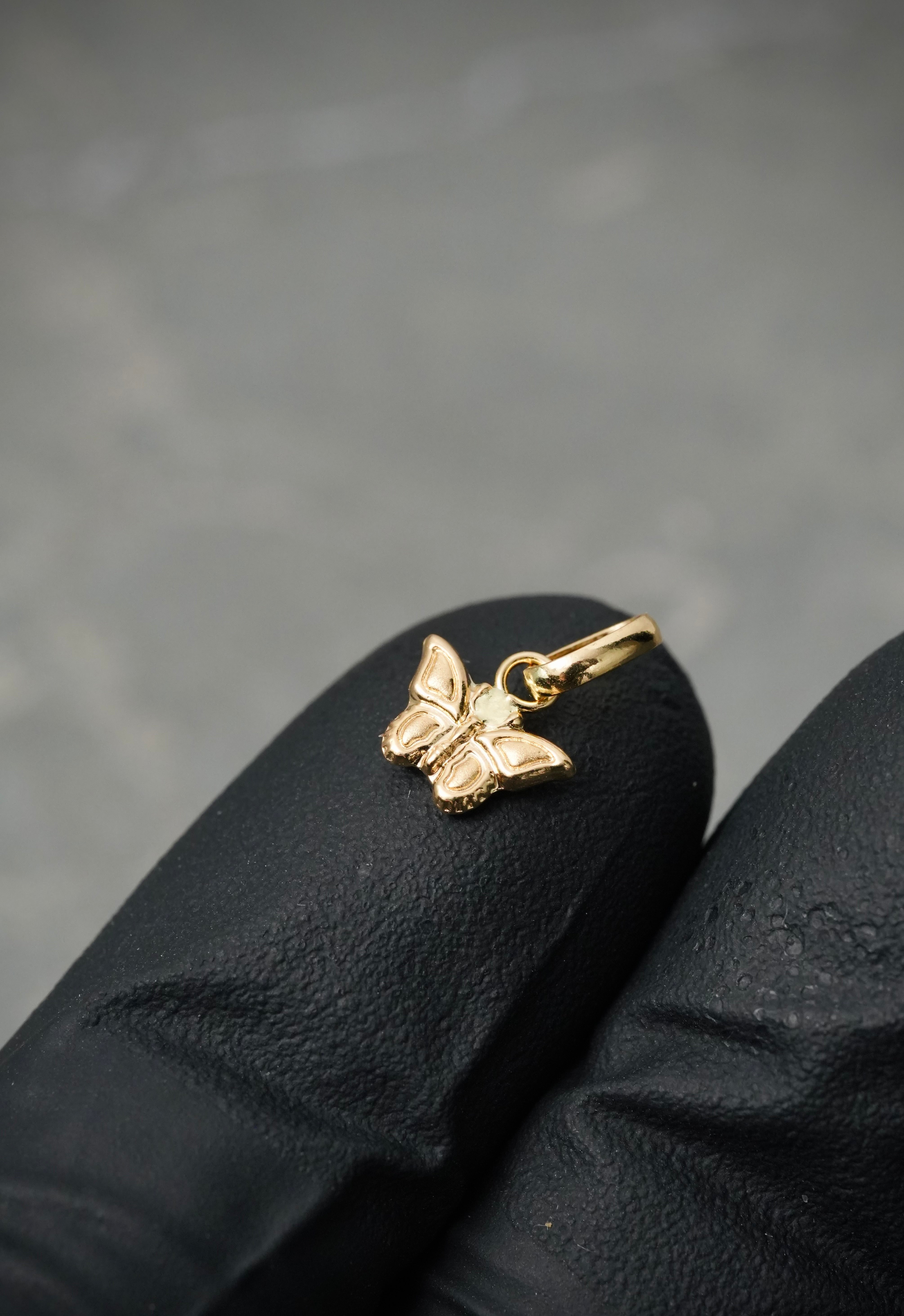 Dije mariposa 0.3gr / Largo 1.1cm — Oro Amarillo