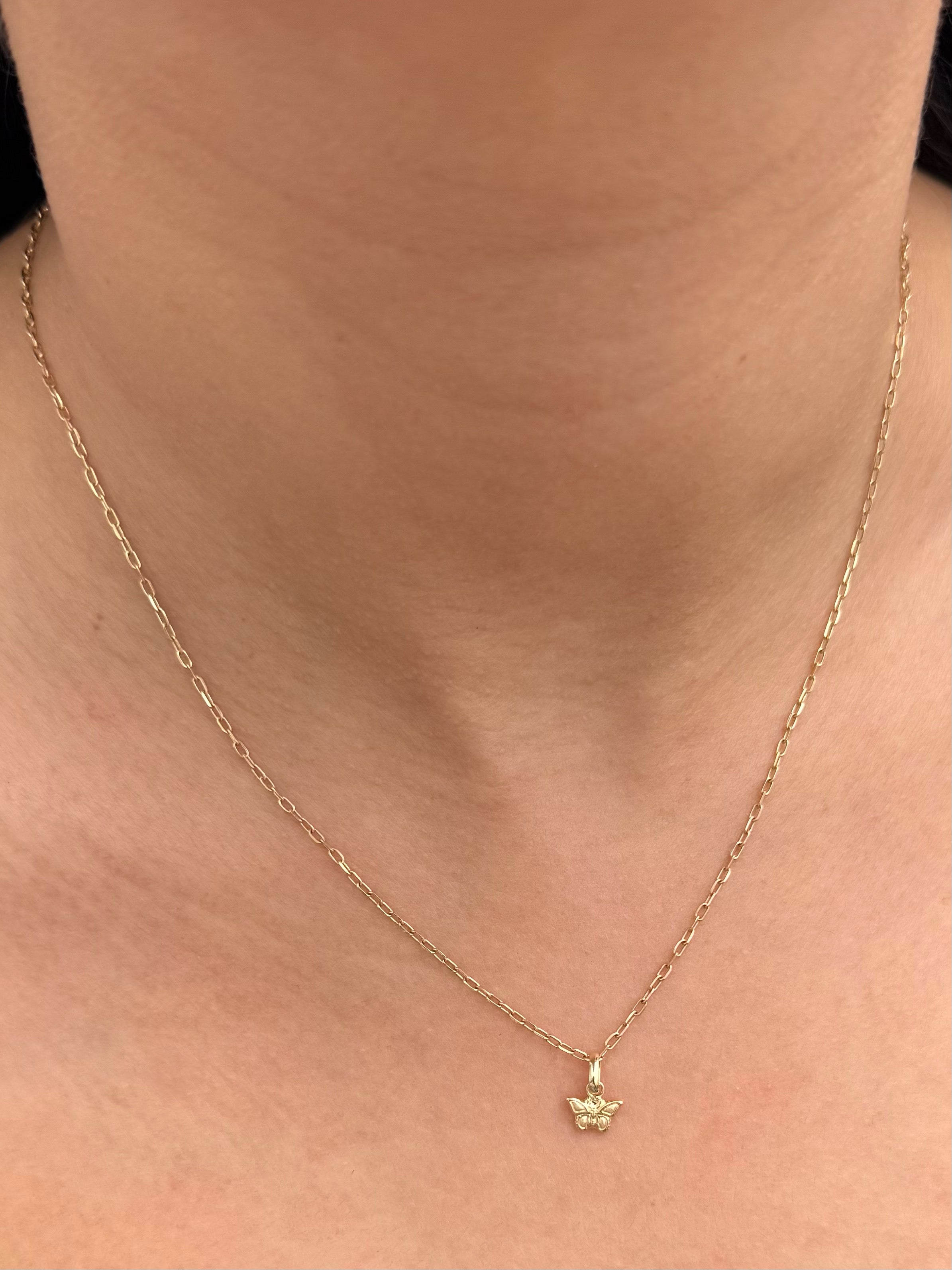 Dije mariposa 0.25gr / Largo 1.3cm — Oro Amarillo