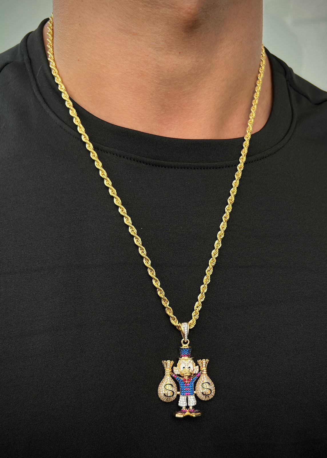 Dije tio rico son swarovski 16gr / Largo 4.7cm / Oro Amarillo Nac P