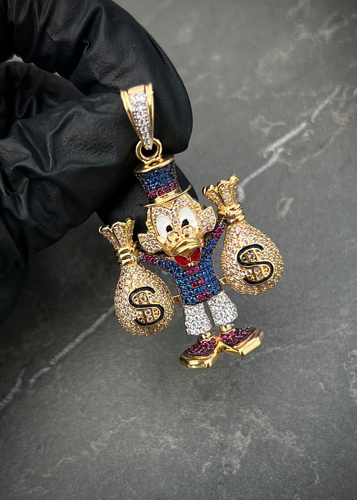 Dije tio rico son swarovski 16gr / Largo 4.7cm / Oro Amarillo Nac P