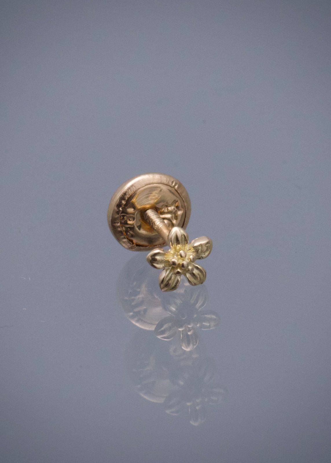 Topos unidad flor 0.35gr / Largo 0.4cm / Oro Amarillo Nac M