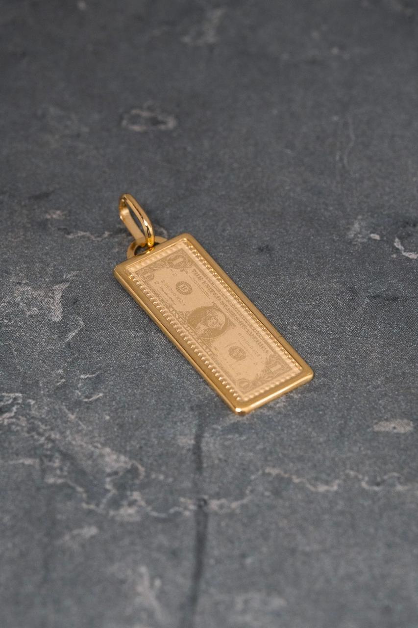 Dije dolar 1.1gr / Largo 3cm — Oro Amarillo