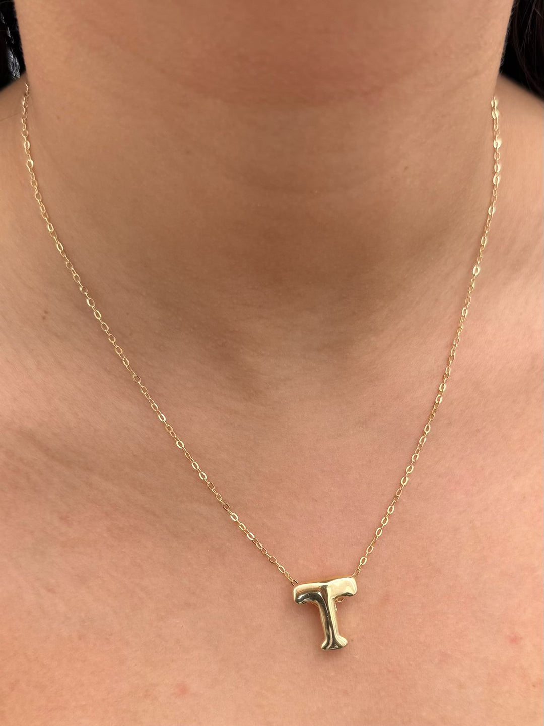 Dije letra t 0.55gr / Largo 1.7cm — Oro Amarillo
