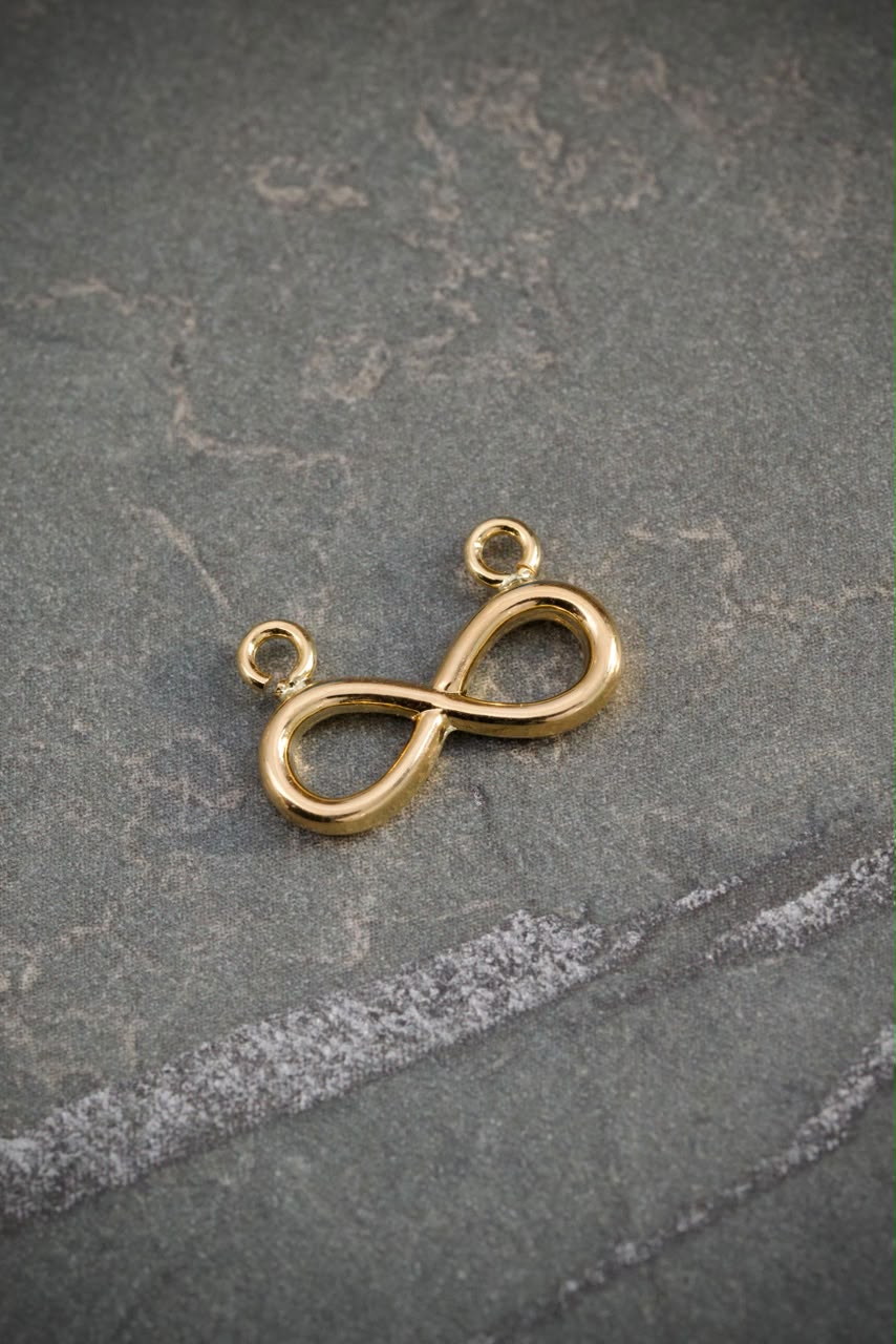 Herraje Infinito 0.45gr / 1.3cm / 9.3mm — Oro Amarillo
