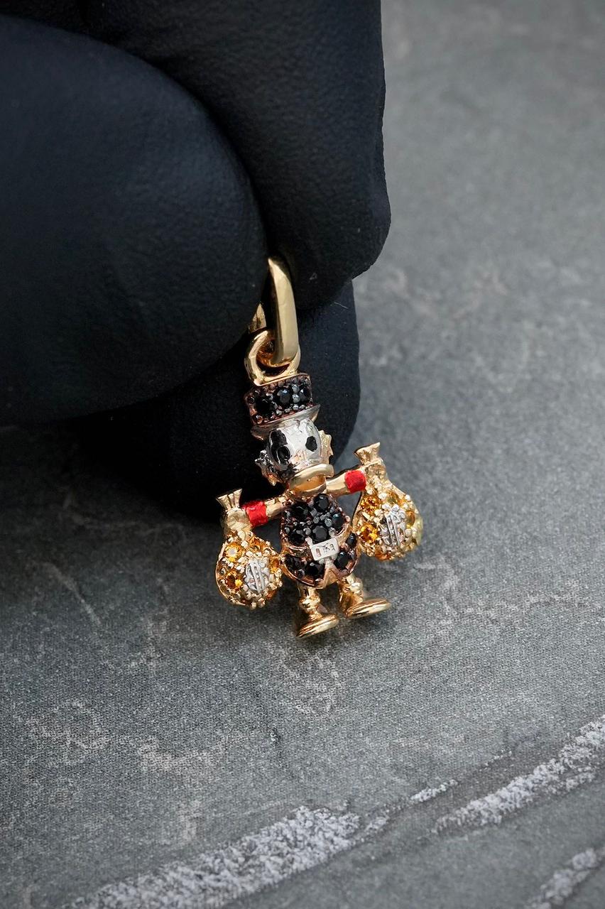 Dije tio rico con swarovski negro y amarillo 1.6gr / Largo 2.1cm — Oro Amarillo
