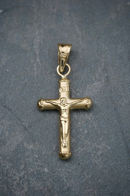 Dije cruz con cristo 0.7gr / Largo 2.9cm / Oro Amarillo Nac B