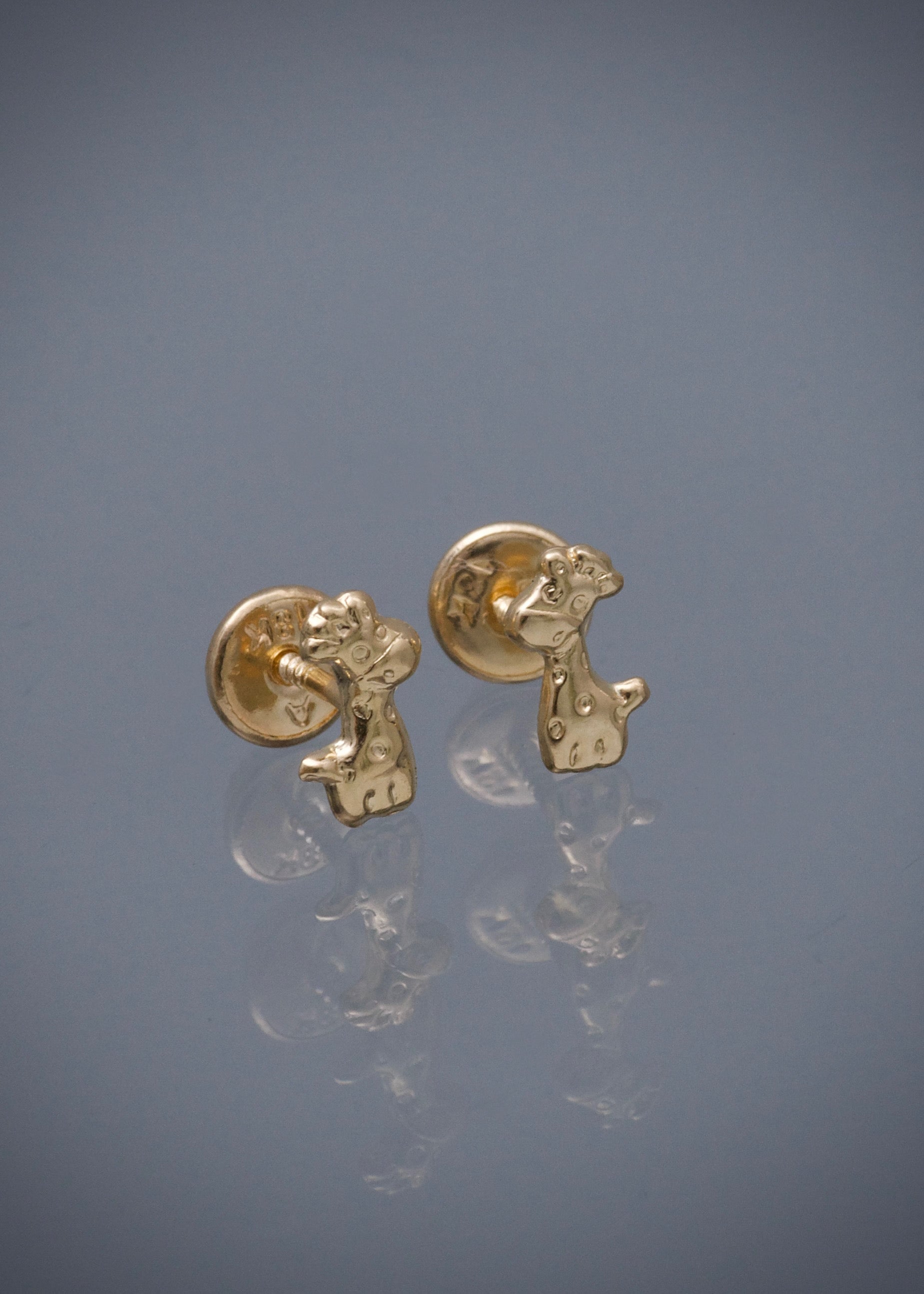 Topos jirafa 0.55gr / Largo 0.7cm / Oro Amarillo Nac M