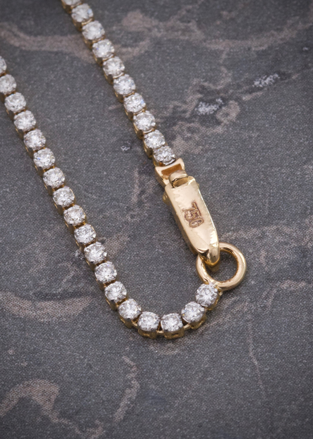 Pulso tenis con 130 pts de diamantes 2.2gr / largo 17.5cm — Oro Amarillo