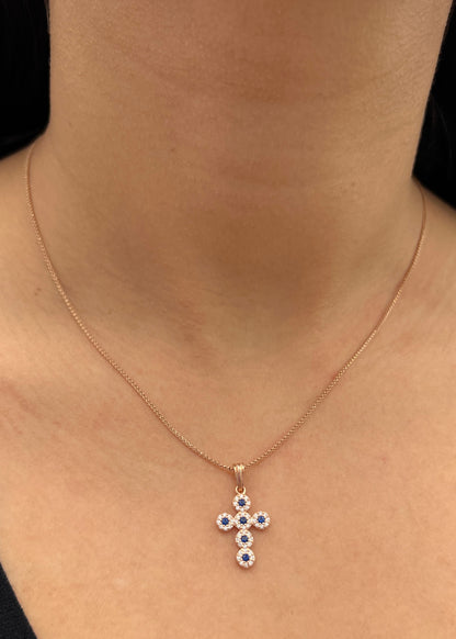 Dije cruz con swarovski azul y blanco 1.6gr / Largo 2.5cm / Oro Rosado Nac M