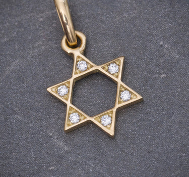 Dije estrella de david con swarovski blanco 0.65gr / Largo 1.7cm / Oro Amarillo Nac B