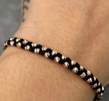 Pulsera en hilo negro con bolas diamantadas 2.15gr / Oro Rosado Nac (Joya) P