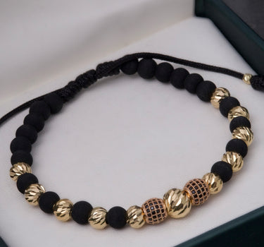 Pulsera en hilo negro con bolas de fuego 4.6gr / Dos Oros (Joya) M