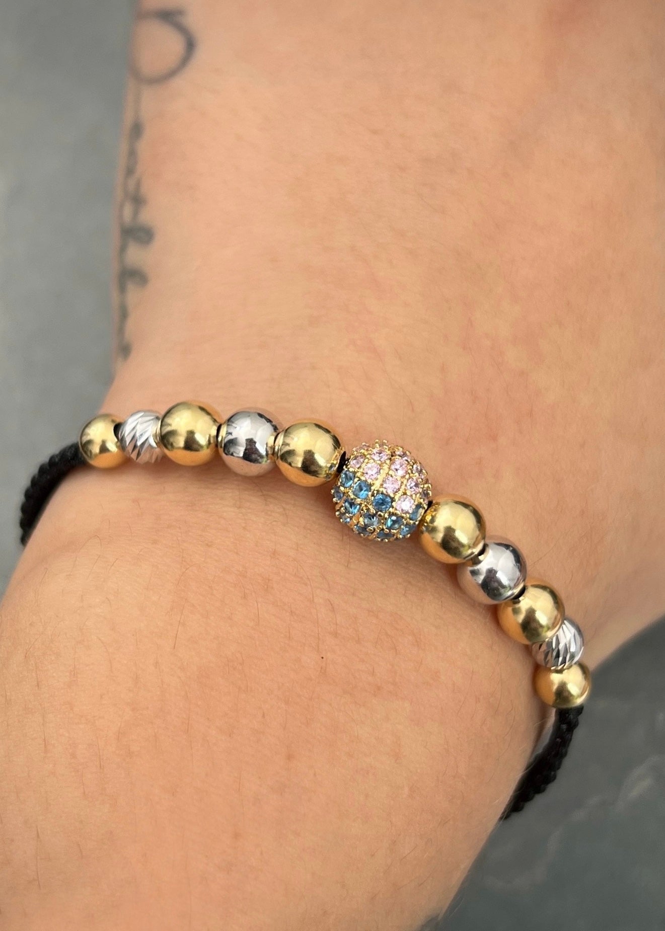 Pulsera en hilo negro con bola de fuego 3.85gr / Dos Oros (Joya) M