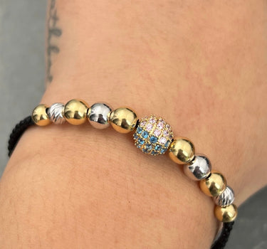 Pulsera en hilo negro con bola de fuego 3.85gr / Dos Oros (Joya) M