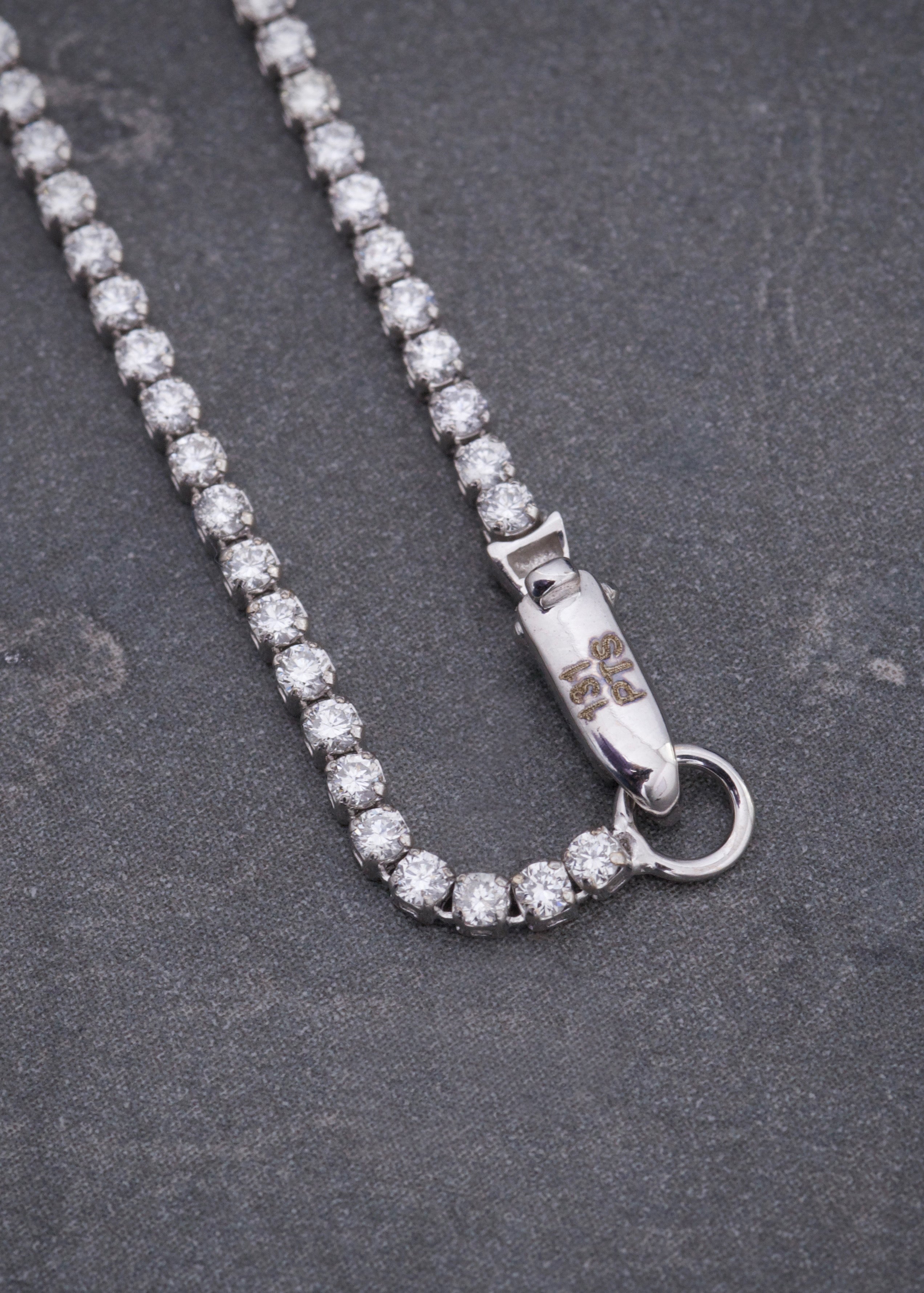Pulso tenis con 131pts de diamantes 2.1gr / Largo 18cm / Oro Blanco (Joya) M
