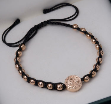 Pulsera en hilo negro con herraje san benito 2.2gr / Oro Rosado (Joya) M