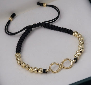 Pulsera en hilo negro con herraje infinito 1.95gr / Oro Amarillo (Joya) M