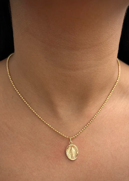 Dije virgen de la milagrosa 0.9gr / Largo 2.2cm / Oro Amarillo Nac M