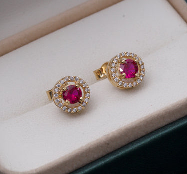 Topos con swarovski fucsia y blanco 3.25gr / Largo 1 cm / Oro Amarillo Nac P