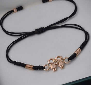 Pulsera en hilo negro con herraje niñas 2.55gr / Oro Rosado (Joya)*