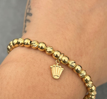 Pulsera en hilo negro con dije corona 3.5gr / Oro Amarillo (Joya) M