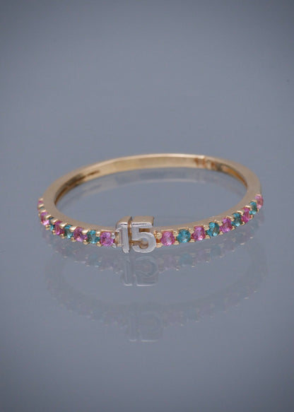 Anillo de 15s con swarovski rosado y azul 1.25gr / TALLA 7 / Oro Amarillo Nac M