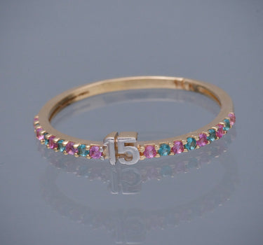 Anillo de 15s con swarovski rosado y azul 1.25gr / TALLA 7 / Oro Amarillo Nac M