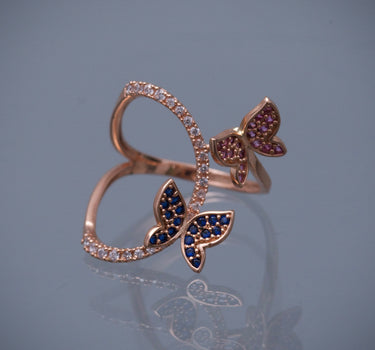 Anillo mariposas con swarovski 2.55gr / Talla 5 3/4 / Oro Rosado Nac B