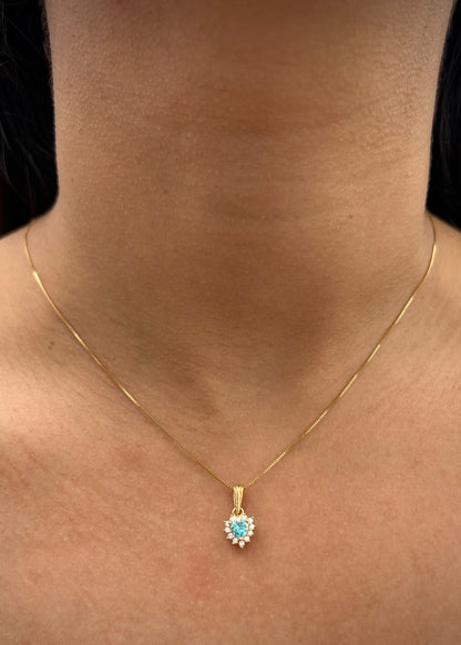 Dije corazon con swarovski azul y blanco 1.2gr / Largo 1.4cm / Oro Amarillo Nac B