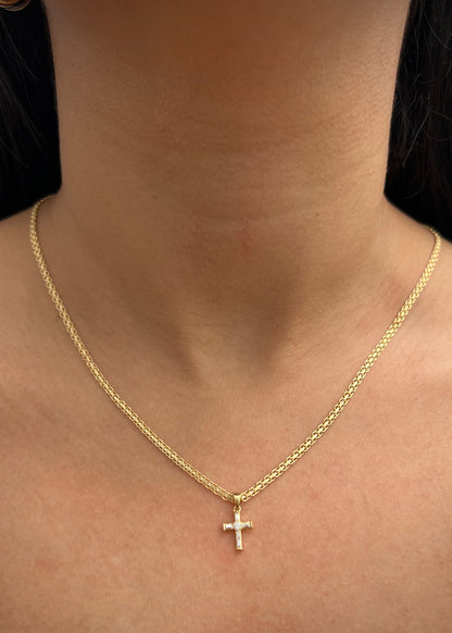 Dije cruz con 12pts moissanita blanco 0.35gr / Largo 1.5cm / Oro Amarillo (Joya) P