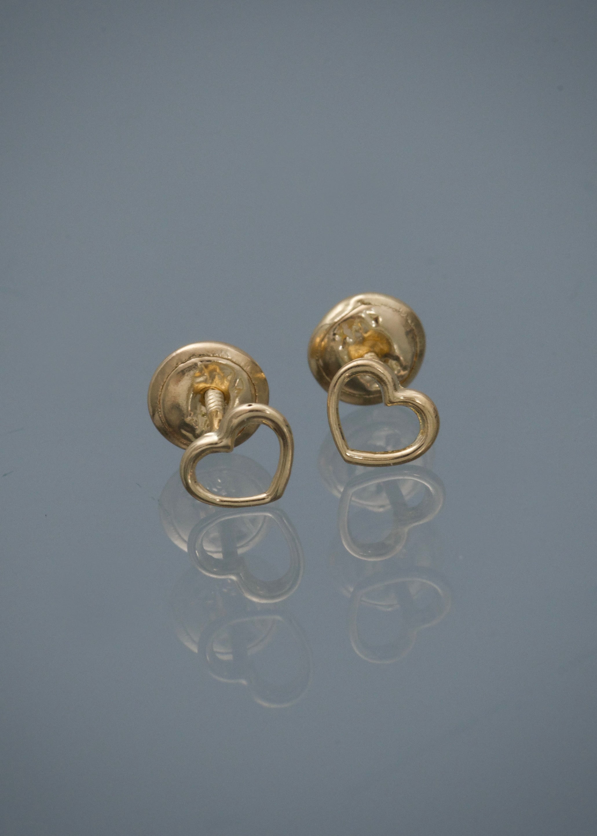 Topos silueta de corazon 0.5gr / Largo 0.5cm / Oro Amarillo Nac B