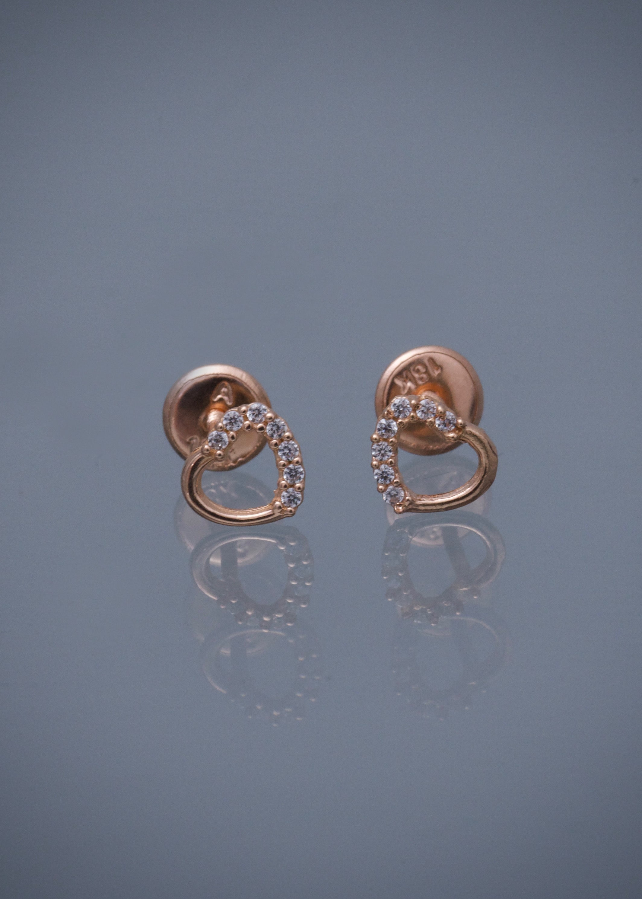 Topos corazon con swarovski blanco 0.65gr / Largo 0.57cm / Oro Rosado Nac M