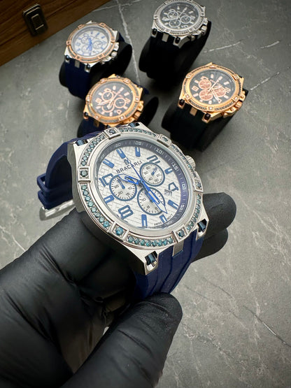 Reloj Bracarli Metal II. Oro Blanco 18k 7.8gr Con 1.80Qts (180Pts) De Diamante Azul Caja Blanca , Fondo Blanco Y Correa Azul M