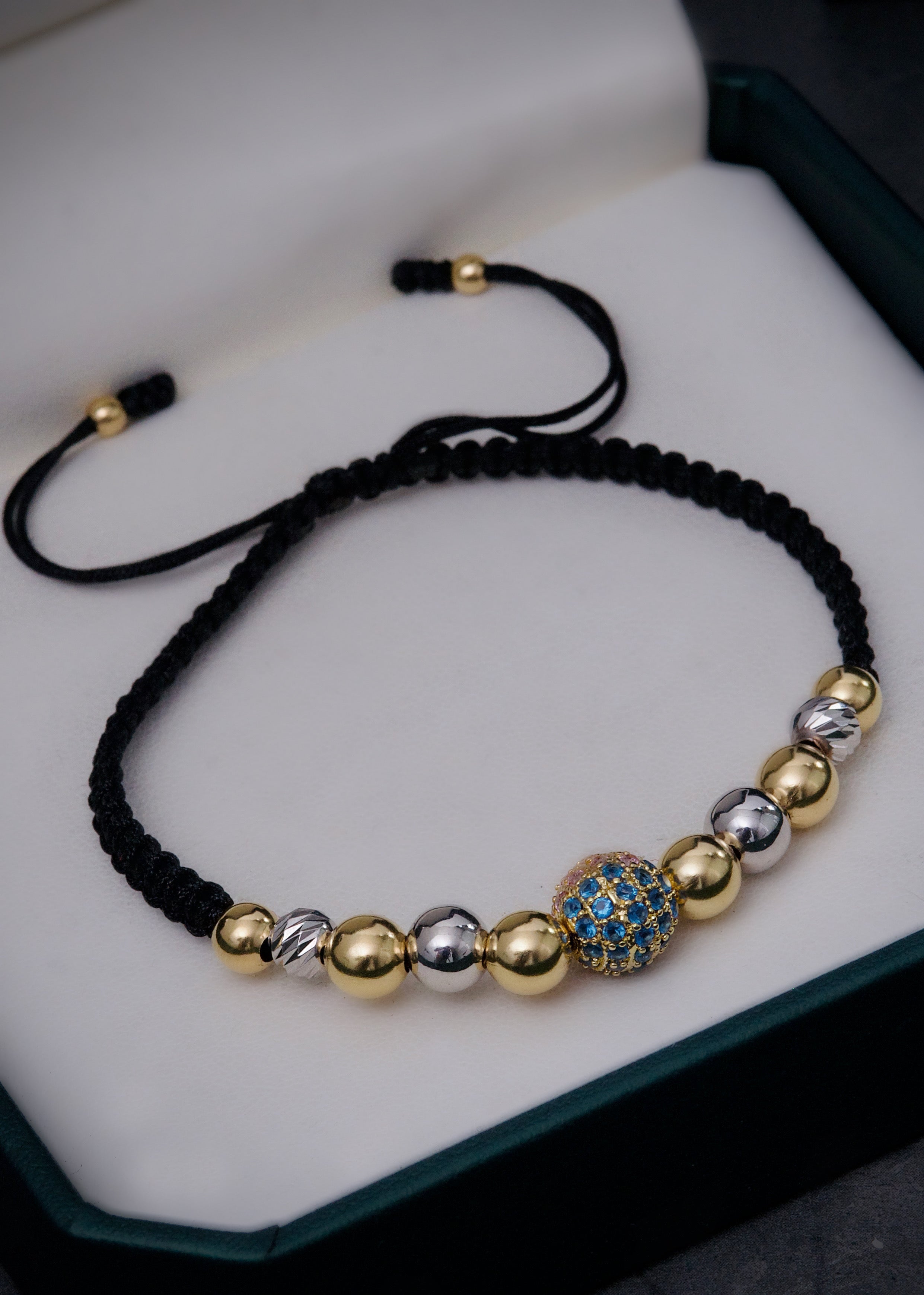 Pulsera en hilo negro con bola de fuego 3.85gr / Dos Oros (Joya) M