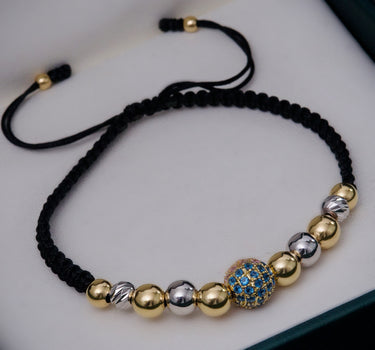 Pulsera en hilo negro con bola de fuego 3.85gr / Dos Oros (Joya) M