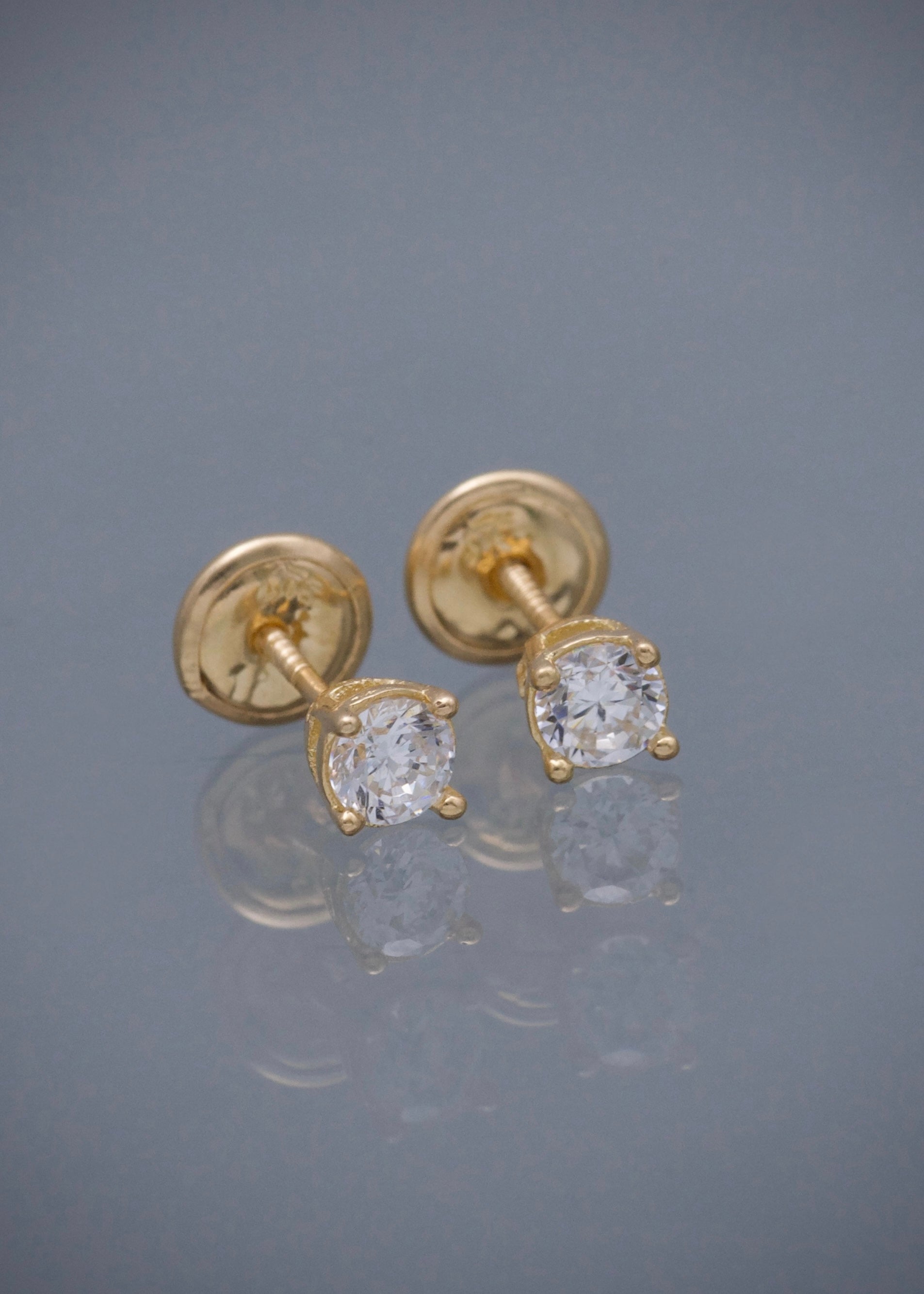 Topos con swarovski blanco 0.9gr / Largo 0.38cm / Oro Amarillo Nac*