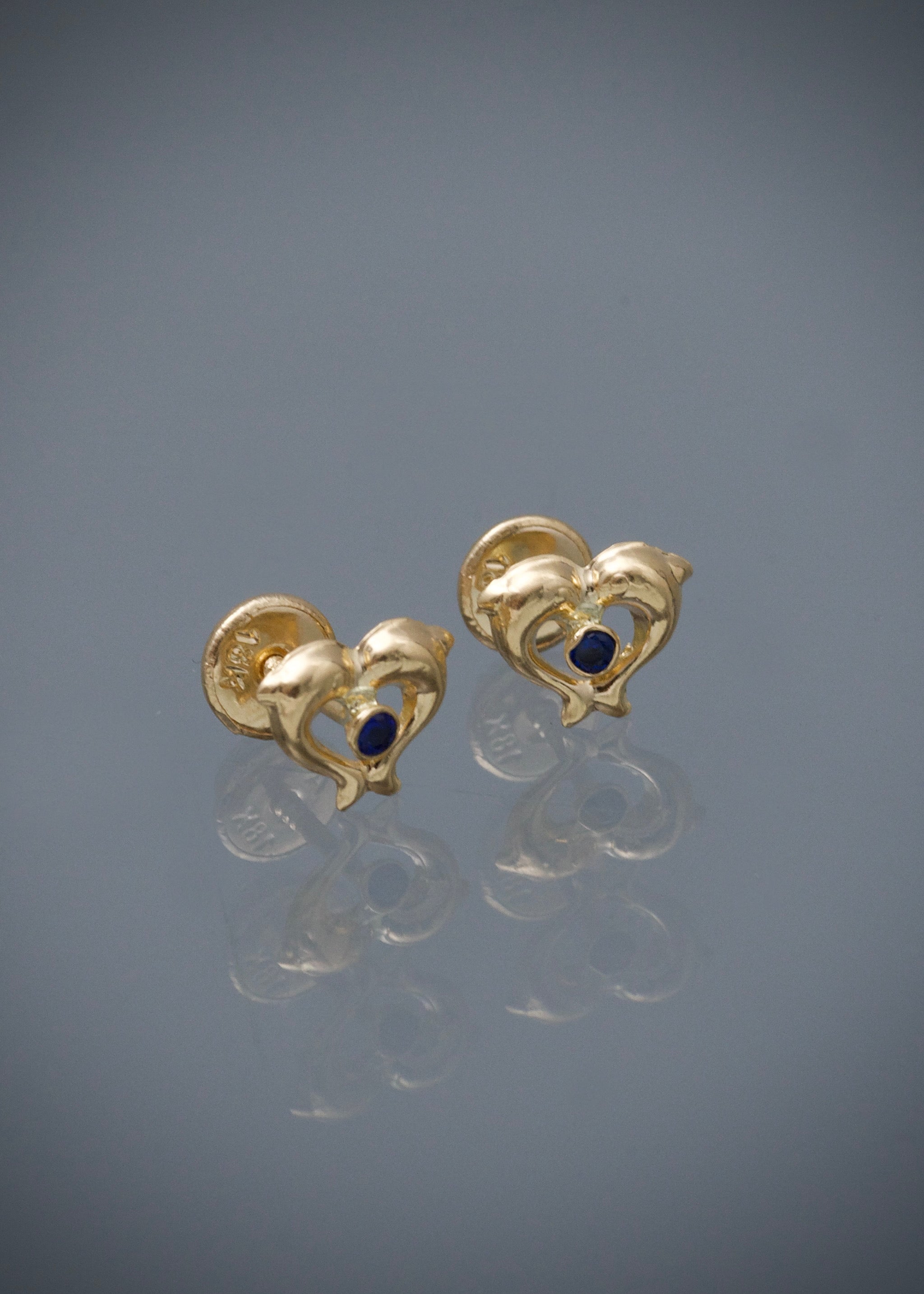 Topos delfines con swarovski azul 0.55gr / Largo 0.6cm / Oro Amarillo Nac P