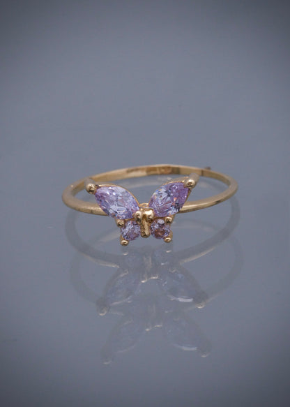 Anillo mariposa con swarovski morado 1.3gr / Talla: 5 / Oro Amarillo Nac B