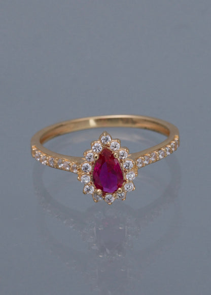 Solitario gota con swarovski fucsia y blanco 2.4gr / Talla 7 / Oro Amarillo Nac B