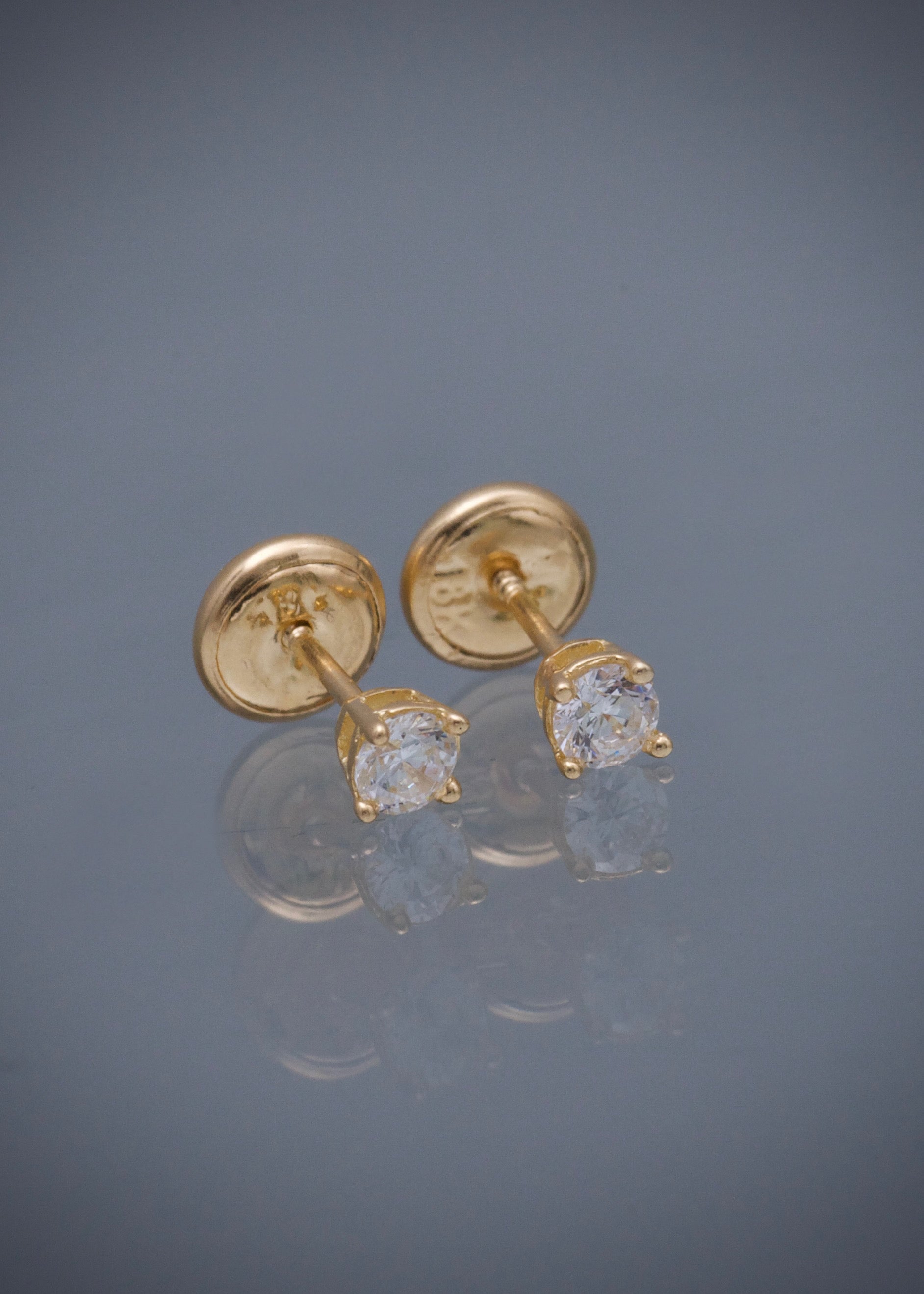 Topos con swarovski blanco 0.6gr / Largo 0.32cm / Oro Amarillo Nac P