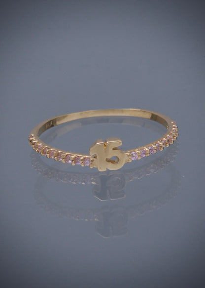 Anillo de 15s con swarovski rosado 1.1gr / TALLA 7 / Oro Amarillo Nac M