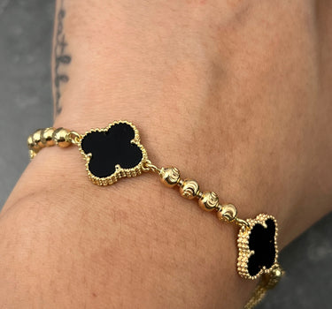 Pulso lucky clover piedra negra 13.05gr / Largo 20cm / Oro Amarillo Nac B