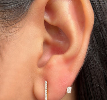 Topos con 24pts de diamantes y 21pts de diamantes baguette 2.5gr / Largo 1.7cm / Oro Amarillo (Joya) M