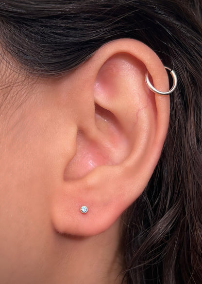 Topos circulo con swarovski azul 0.4gr / Largo 0.22cm / Oro Amarillo Nac P
