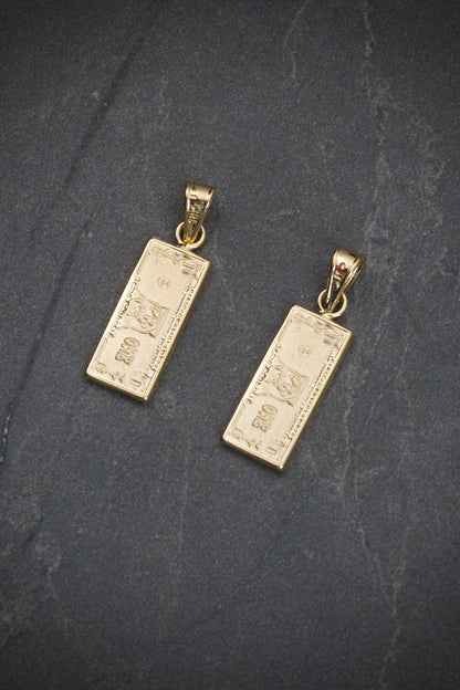 Dije dolar 0.8gr / Largo 2.3cm — Oro Amarillo