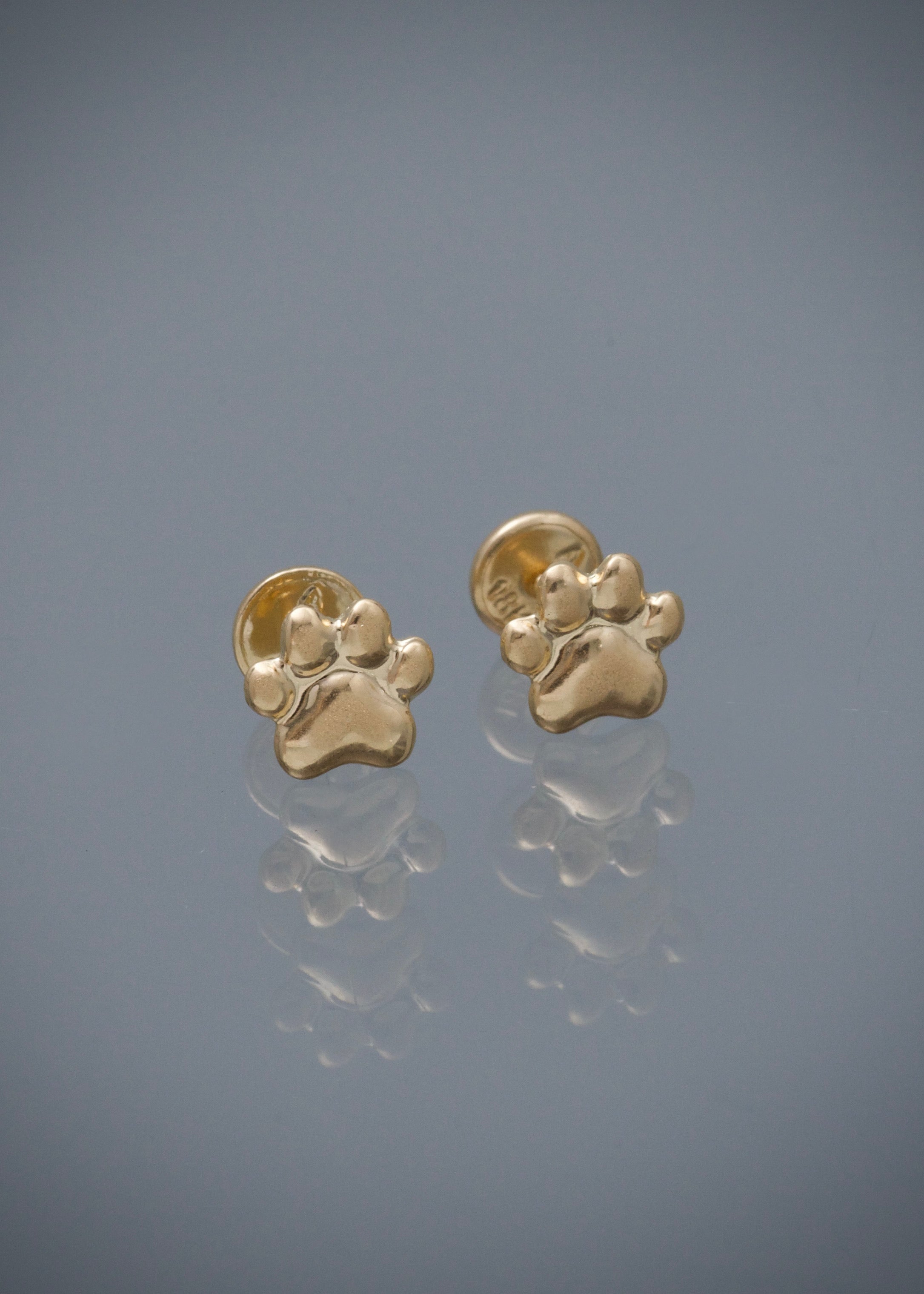Topos huella 0.6gr / Largo 0.7cm / Oro Amarillo Nac B