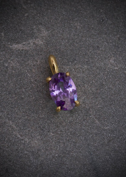 Dije con swarovski lila 0.4gr / Largo 0.9cm / Oro Amarillo Nac M