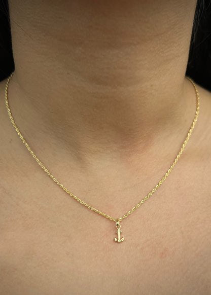 Dije ancla 0.25gr / Largo 1.4cm — Oro Amarillo
