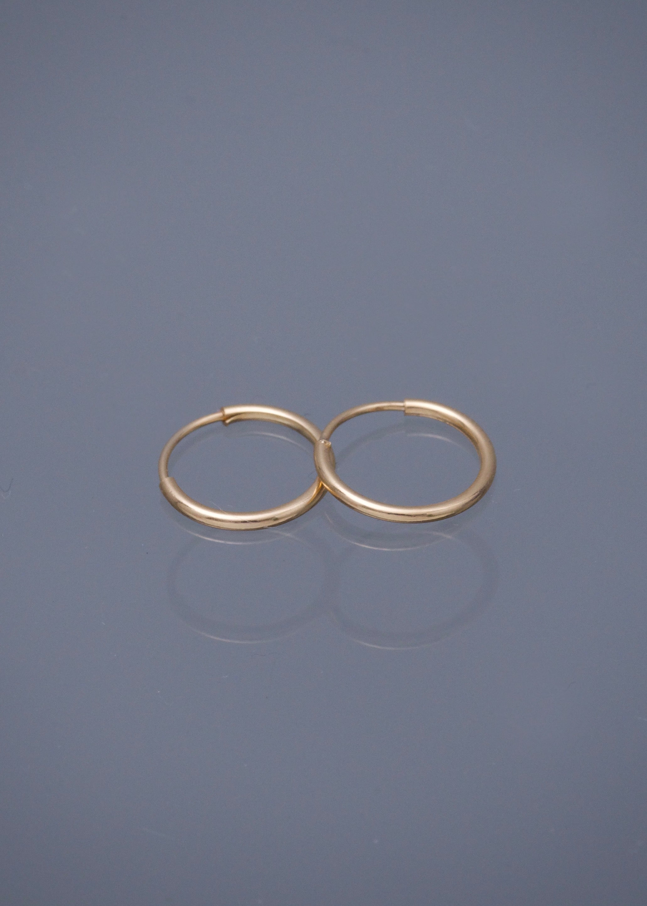 Candongas lisas 0.4gr / Largo 1cm / Oro Amarillo Nac*